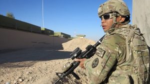 Pictured, Spc. Ignacio D. Meno of Bravo Company, 1st Battalion, 294th Infantry Regiment, Guam Army National Guard, scans his sector during a security mission late October at Main Operating Base LashKar Gah, Helmand province, Afghanistan. (U.S. Army National Guard photo by Sgt. Eddie Siguenza.)