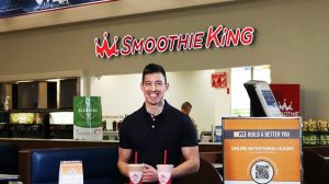 Exchange BE FIT Ambassador Roy Montez stands in front of Smoothie King