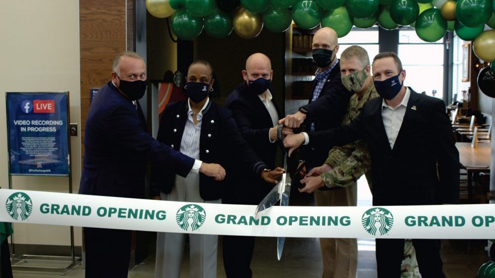 Army & Air Force Exchange Service and Starbucks officials cut the ribbon on the Exchange’s 100th Starbucks retail licensed location Sept. 17 at Joint Base Lewis-McChord. From left, Ronny Rexrode, Vice President, Food and Theater Operations, Exchange; Shelly Armstrong, Western Region Senior Vice President, Exchange; Aaron Koransky, Vice President, Licensed Store Business Development, Operations & Strategy, Starbucks; Matt Kress, Senior Manager, Global Responsibility, Starbucks, Col. Skye Duncan, JBLM Garrison Commander; and Mike Einer, JBLM Exchange General Manager.