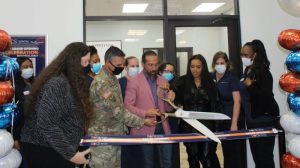 From left, Fort Stewart Exchange General Manager Hollie Morales, Garrison Commander Col. Manuel Ramirez, DOCS Dental owner and CEO Dr. Lawrence Caplin and actress and entrepreneur Angela Simmons cut the ribbon on a new DOCS dental office at the Army & Air Force Exchange Service furniture store mini mall.