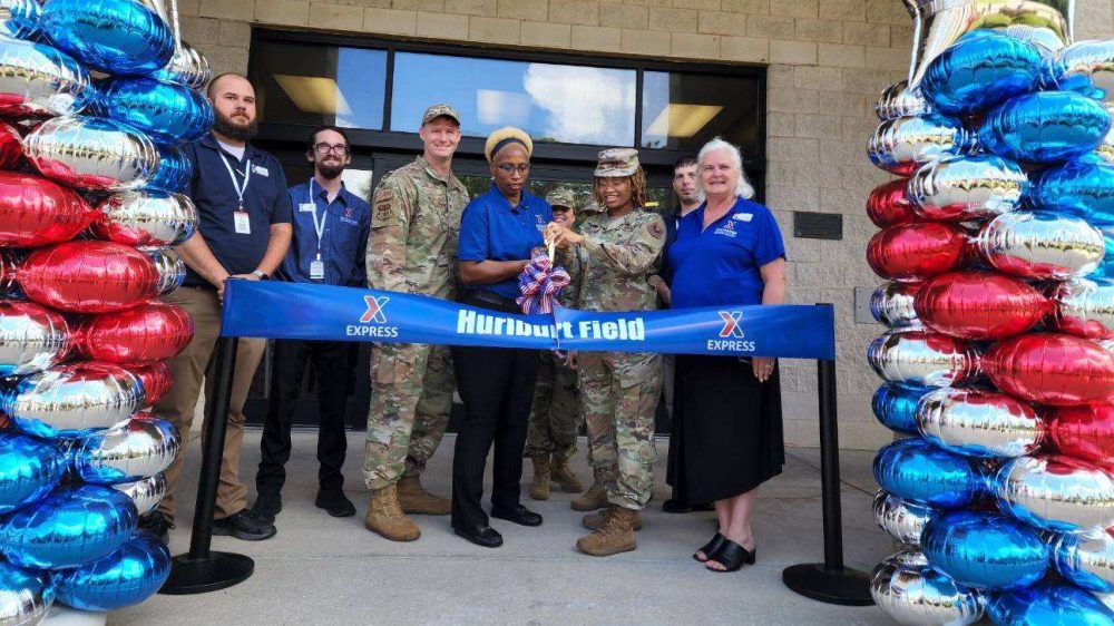 Picture of From left, Hurlburt Field Express Shift Manager Adam Roggenkamp, Express Shift Manager James Culver, 1st Special Operations Mission Support Group Commander Col. Dustin Richards, Express Facility Manager Larissa Odom, Senior Airman Vivian Abram and Exchange General Manager Sheila Clark cutting the ribbon on the updated Hurlburt Field Express July 22.