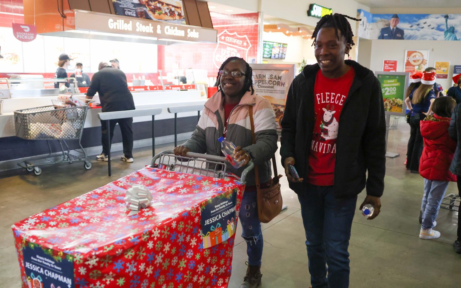 Navy Petty Officer Second Class Jessica Chapman and Thomas Chapman had their holiday merchandise on layaway for their children paid off.