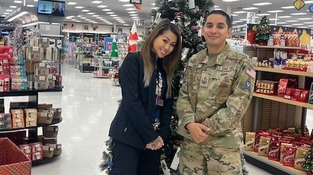 Supervisory Customer Experience Associate Yuka Munoz with Space Force winner Master Sgt. Gilbert Garcia