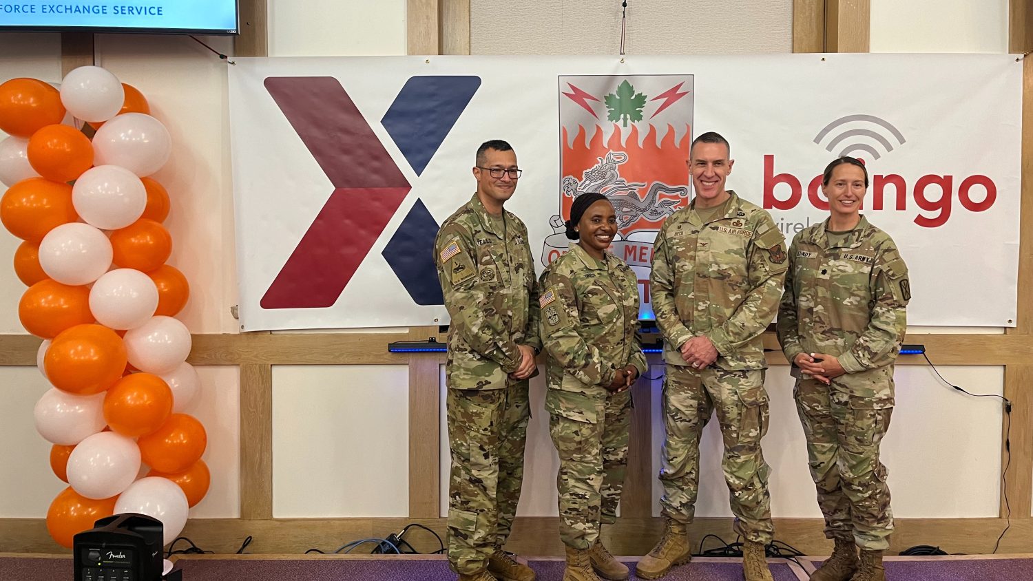 Command Sgt. Maj. Mahoma Tello, 307th ESB-E; Sgt. Maj. Generose Green, Exchange Pacific Region senior enlisted advisor; Col. Jason Beck, Exchange Pacific Region commander; Lt. Col. Izabella Lundy, 307th ESB-E commander at cell tower ceremony.