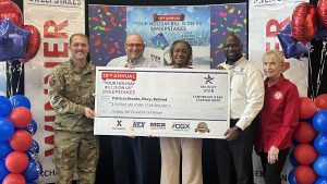 Retired Naval Chief Petty Officer Patricia Brooks received a once-in-a-lifetime surprise in having her MILITARY STAR card balance paid in full at the Exchange as part of the Your Holiday Bill Is on Us sweepstakes.