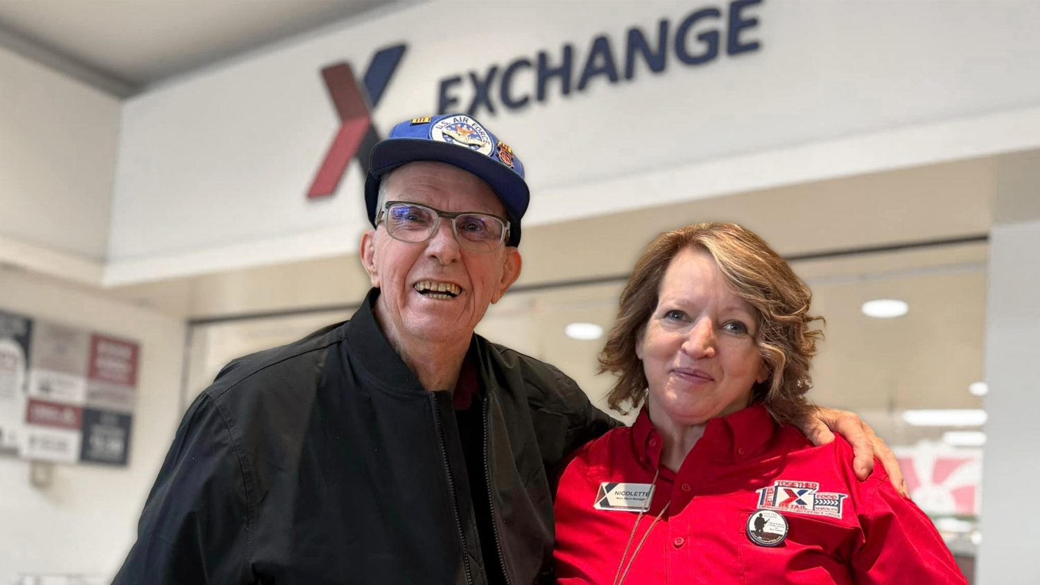 A veteran poses in the Exchange mall with an Exchange associate.