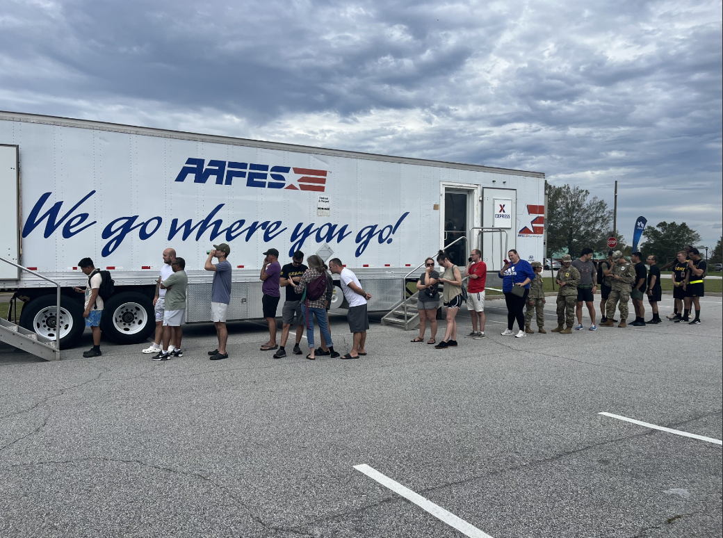 People standing in line at the MFE.