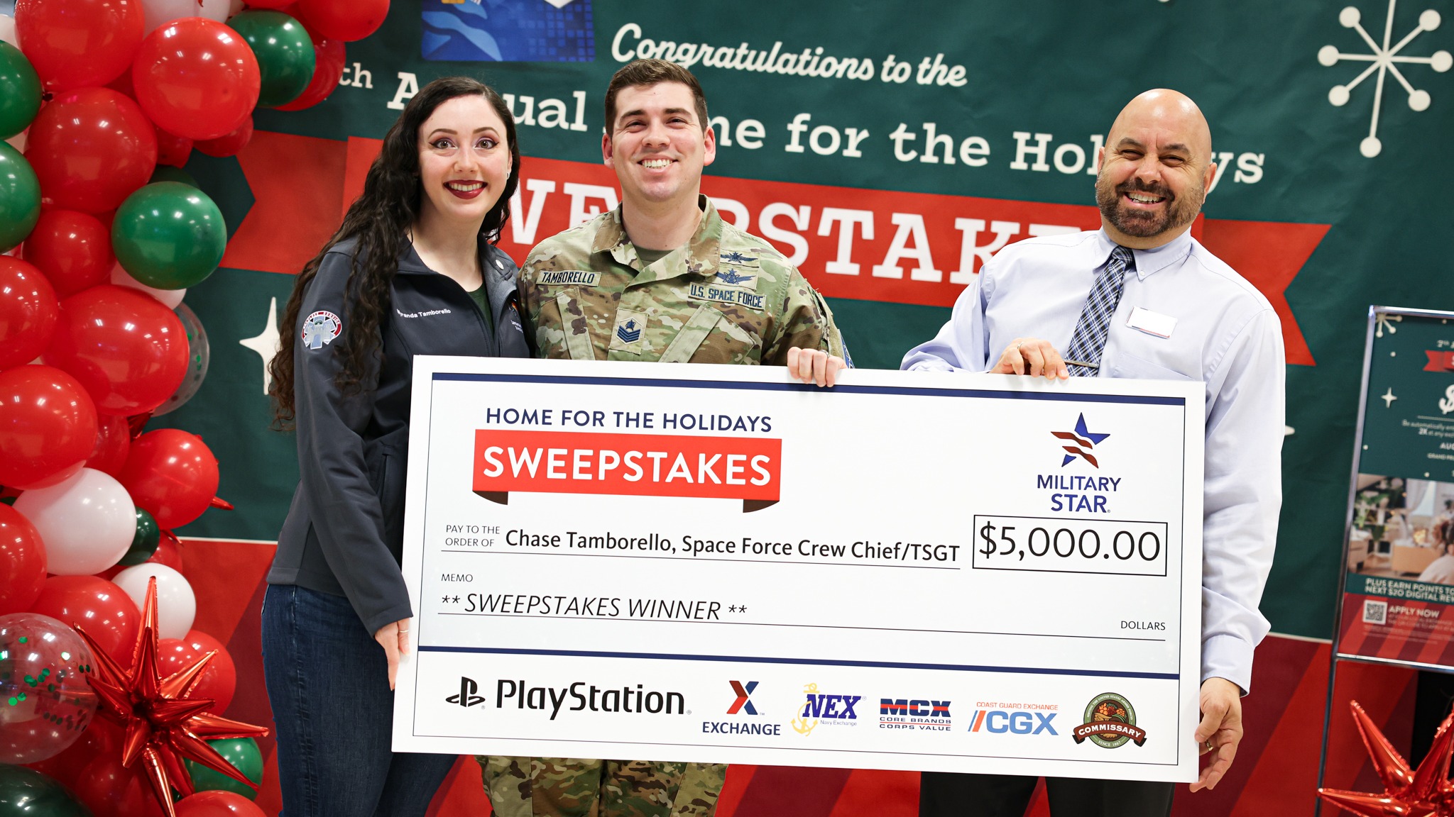 Space Force TSgt. Chase Tamborello presented with his winnings at Ramstein Air Base.